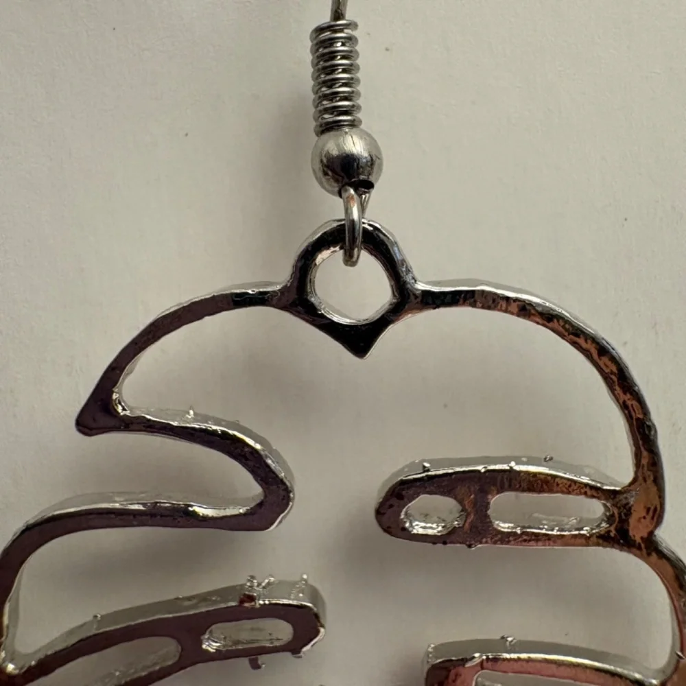 Palm Leaf Earrings in Silvertone.